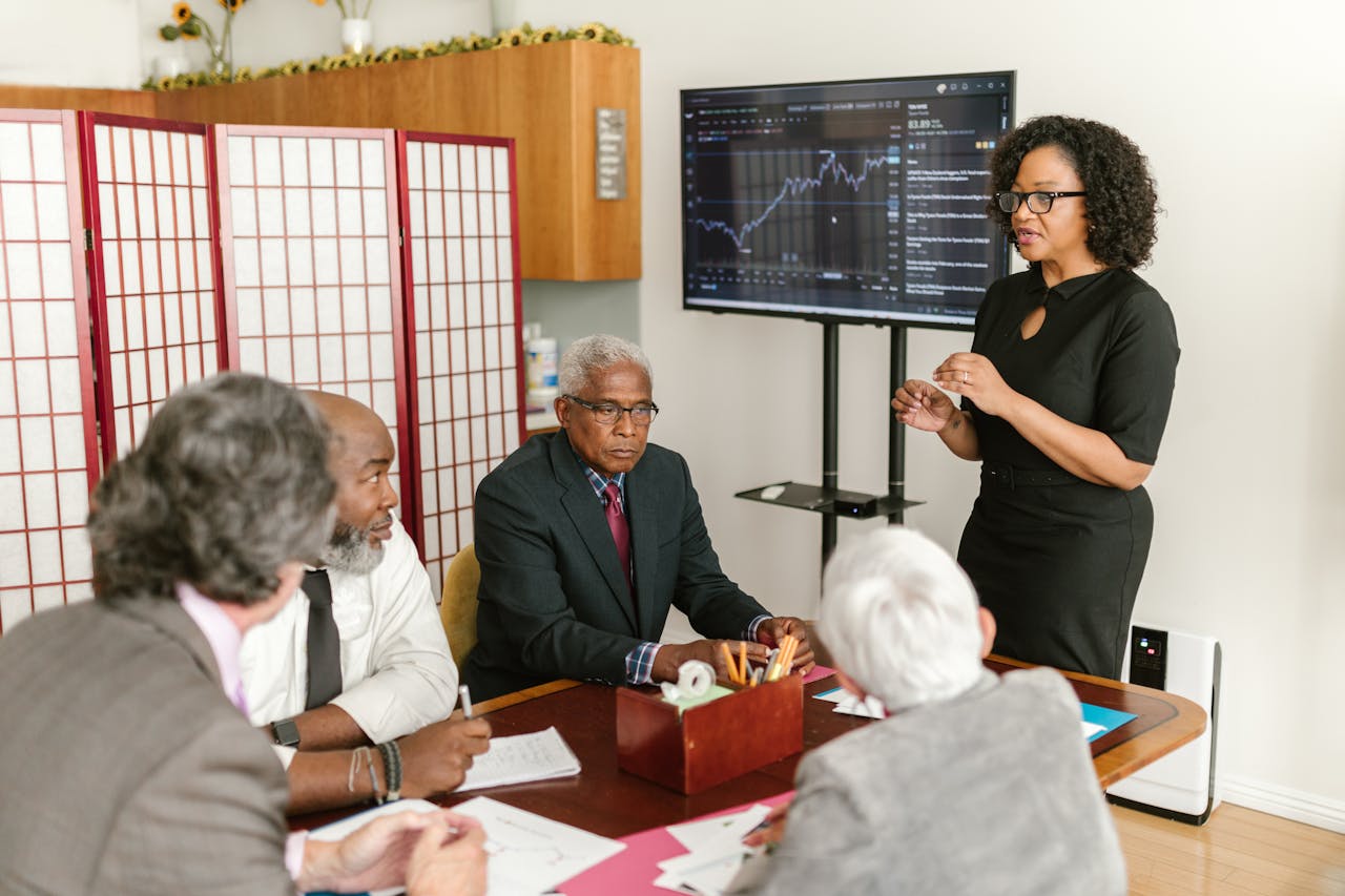 Business professionals discussing data insights in a modern office setting.